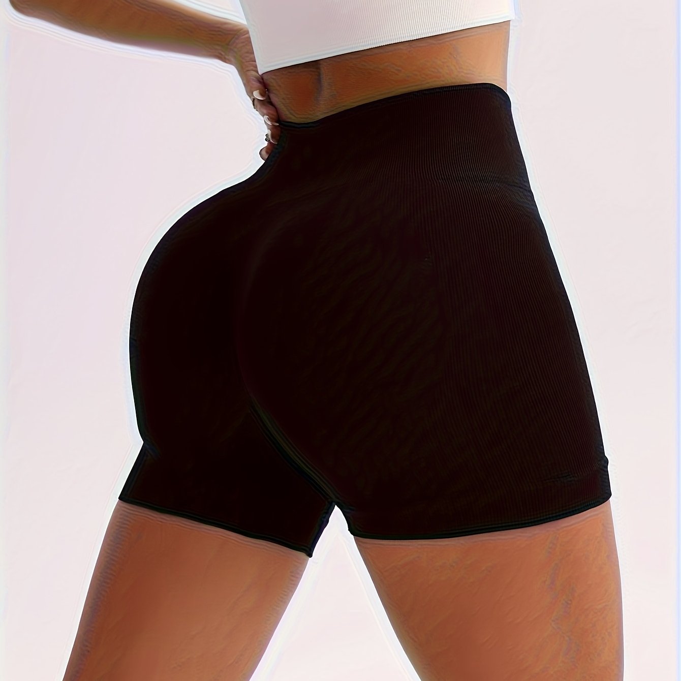New Seamless High-Waisted Peach Butt Yoga Shorts for Women, Perfect for Fitness, Running, And Sports, with a Three-Quarter Length.