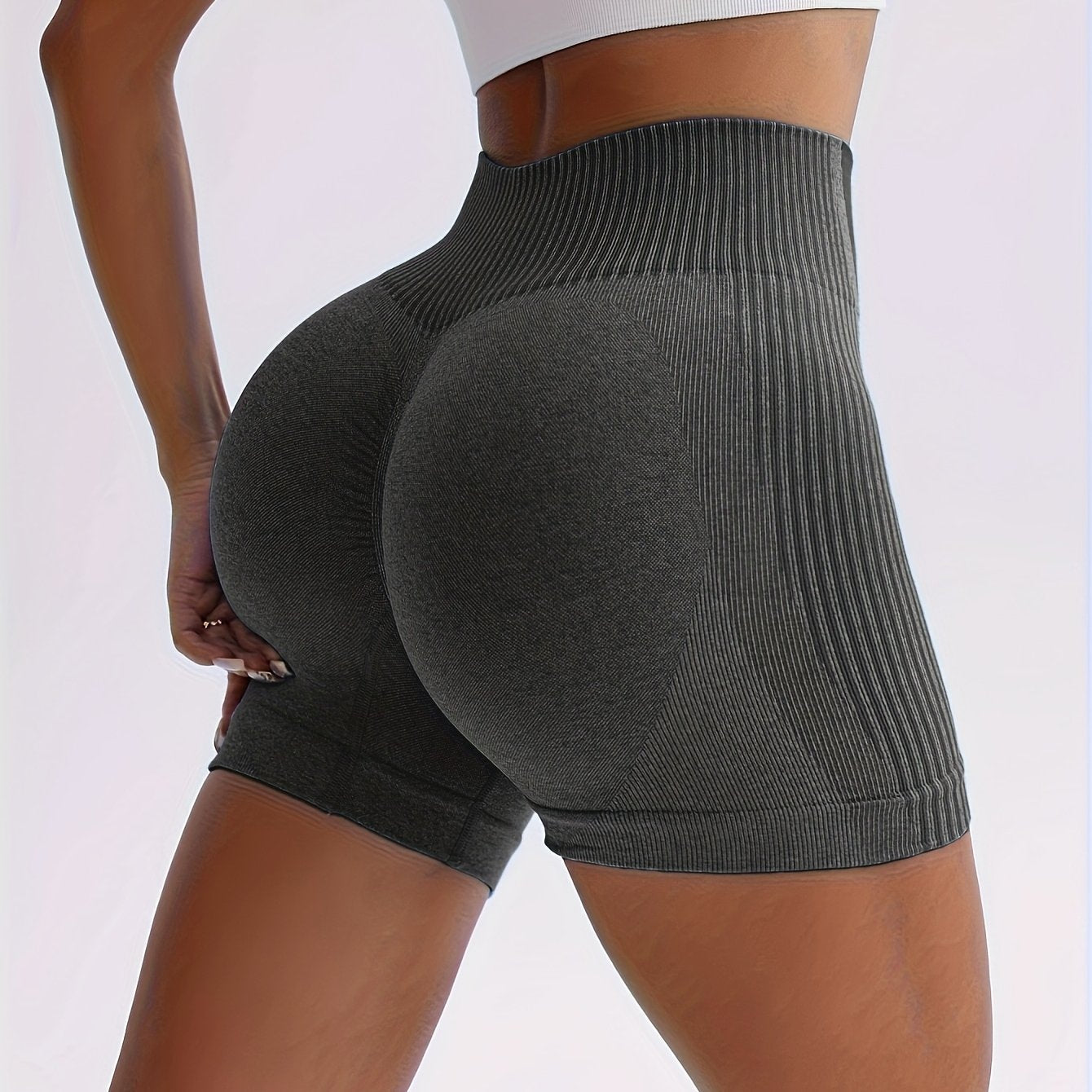 New Seamless High-Waisted Peach Butt Yoga Shorts for Women, Perfect for Fitness, Running, And Sports, with a Three-Quarter Length.